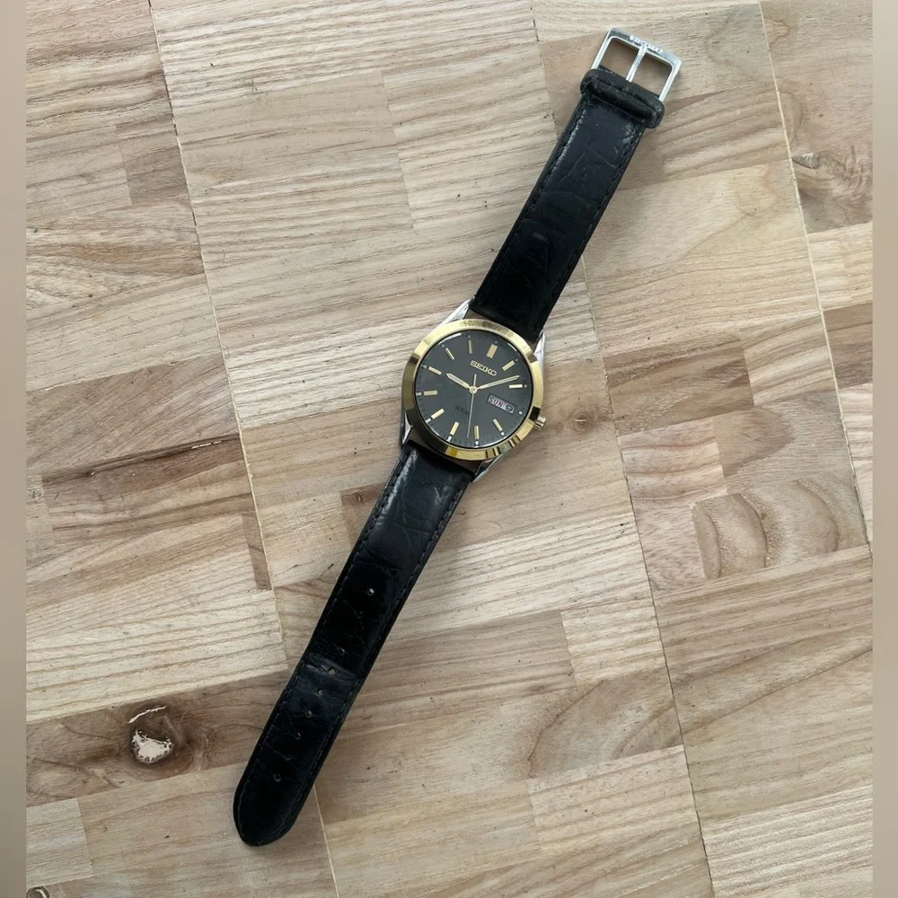Seiko Solar Men’s Watch Two-Tone Case Dark Gray Dial Date Window Leather Strap